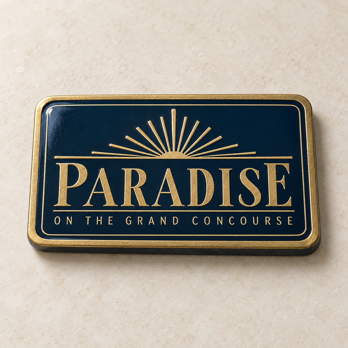 Realistic concept mockup of a navy and gold Paradise souvenir magnet